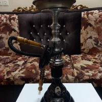 تعدادی قلیان برنجی و استیل و انبر