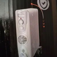 هیتر رادیاتور  روغنی۲۵۰۰ وات فن دار مدل میگل