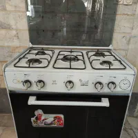 اجاق گاز طرح فر برند زرین سه رنگ گارانتی دار فندک