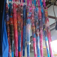 چتر عمده|کفش و لباس بچه|بندر گناوه, |دیوار