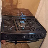 اجاق‌گاز دارای فر و جوجه گردان تکنوگاز