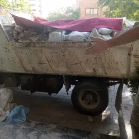 حمل نخاله باکامیون سبک وسنگین توسط کارگروبابکت