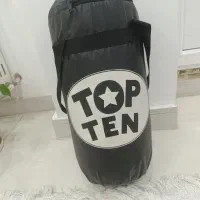 کیسه بوکس ،کلاه ایمنی ،و اسکیت پسرانه