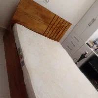 تخت نو به همراه خوشخواب و دو عدد پاتختی