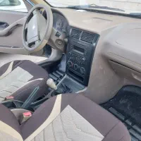 یک دستگاه پژو ۴۰۵ تک سوز نوک مدادی مدل ۹۴