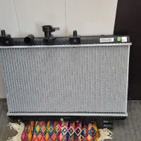 رادیاتور کوییک و چراغ پرژکتور