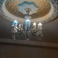 لوستر برنجی طلایی ۹ شاخه کریستالی