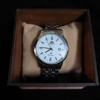 ساعت مچی اوریت آکبند با جعبه چوبی|ساعت|مسجد سلیمان, |دیوار