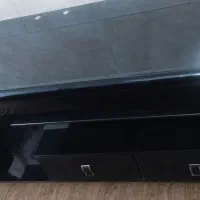 میز تلویزیون شیشه ای در حد نو