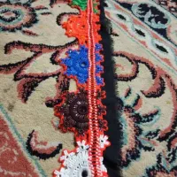 کریشی، آینه، سرتوپ و دوخت روی لباس تپه ای|لباس|خاش, |دیوار