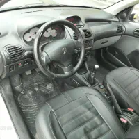 پژو ۲۰۶ وی۸ مدل ۹۹ سفید بیرنگ درحد صفر|خودرو سواری و وانت|بابل, |دیوار