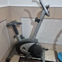 دوچرخه ثابت .چرخونک و حلقه ورزشی مفت هست