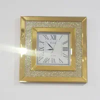 ساعت دیواری طلایی