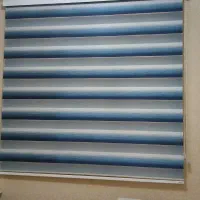 پرده زبرا و میز تحریر یه همراه کتابخانه