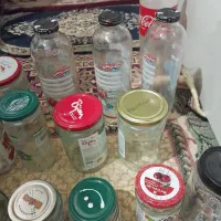 ظروف شیشه ای تمیز با درب فلزی
