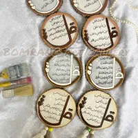 دیوارکوب سفالی و آویز چوبی