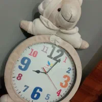 صندلی وساعت وچراغ خواب اتاق نوزاد