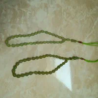 تسبیح شاه مقصود هسته خرما نقره کوب شجر حدید عقیق