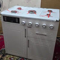 اجاق گاز صفحه استیل بدنه ام‌دی‌اف