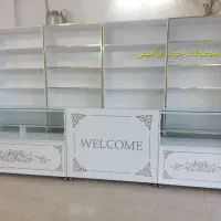 ویترین مغازه میز پاچال شلف قفسه چوبی دکور کتابخانه
