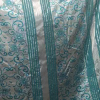 فروش پارچه ساتن کرم .و زری دوزی  فیروزه‌ای