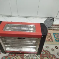 بخاری فن دار|بخاری، هیتر، شومینه|مشهد, بهاران|دیوار