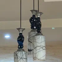 لوستر سه شعله آویزبا بدنه مشکی شیشه طرح دار