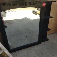 اینه ریلی روی دراور
