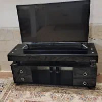 میز تلوزیون تمام شیشه ای درحد‌نو