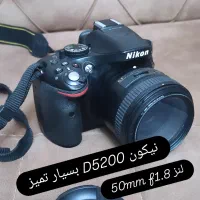 دوربین حرفه ای نیکون d5200 با لنز 50mm f1.8 در حد