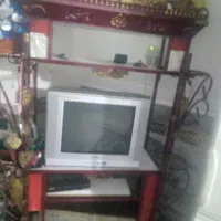 تلوزیون و کمد اهنی