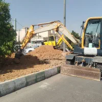 اجاره مینی بیل لاستیکی چکش وپاکت|خدمات حمل و نقل|شیراز, انجیر|دیوار