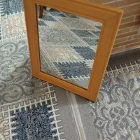 اینه با قاب چوبی