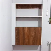 قفسه کتابخانه با میز تاشو