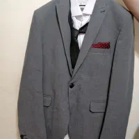 فروش یک دست کت شلوار نو
