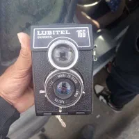 دوربین عتیقه ماشین حساب عتیقه سرمدان