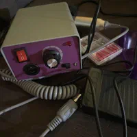دستگاه کاشت ناخن
