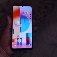 گوشی پوکو C65حدود یکسال خریدم تمیز و سالم