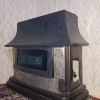 بخاری طرح شومینه در حد نو آک آک قیمت مناسب