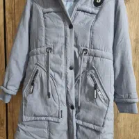 کاپشن|لباس|کهنوج, |دیوار