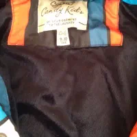 کاپشن|کفش و لباس بچه|قم, شهدا|دیوار