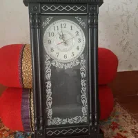 ساعت وآلبوم چرخ وفلکی