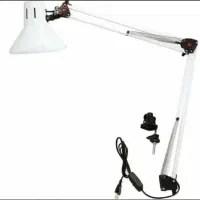 دست مصنوعی تمرینی و چراغ مطالعه