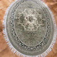 فرش بیضی و پادری سبز