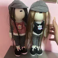 عروسک دوقولو