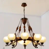 لوستر ۶ و ۸ شعله و چراغ دیواری دارکار طرح رومی