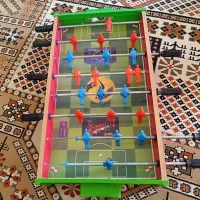 فوتبال دستی و پشه بند نوزاد