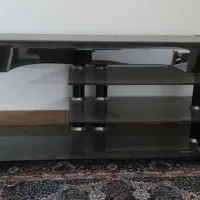 زیر تلویزیونی شیشه ای