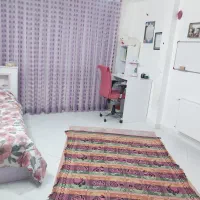 صندلی چرخدار صورتی