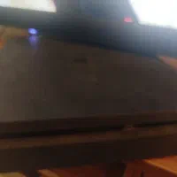 پی اس فور اسلیم یک ترا همراه با دسته اضافه و دیسک